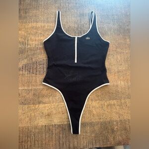 ALO Yoga Supernova Zip Up Bodysuit Black and White